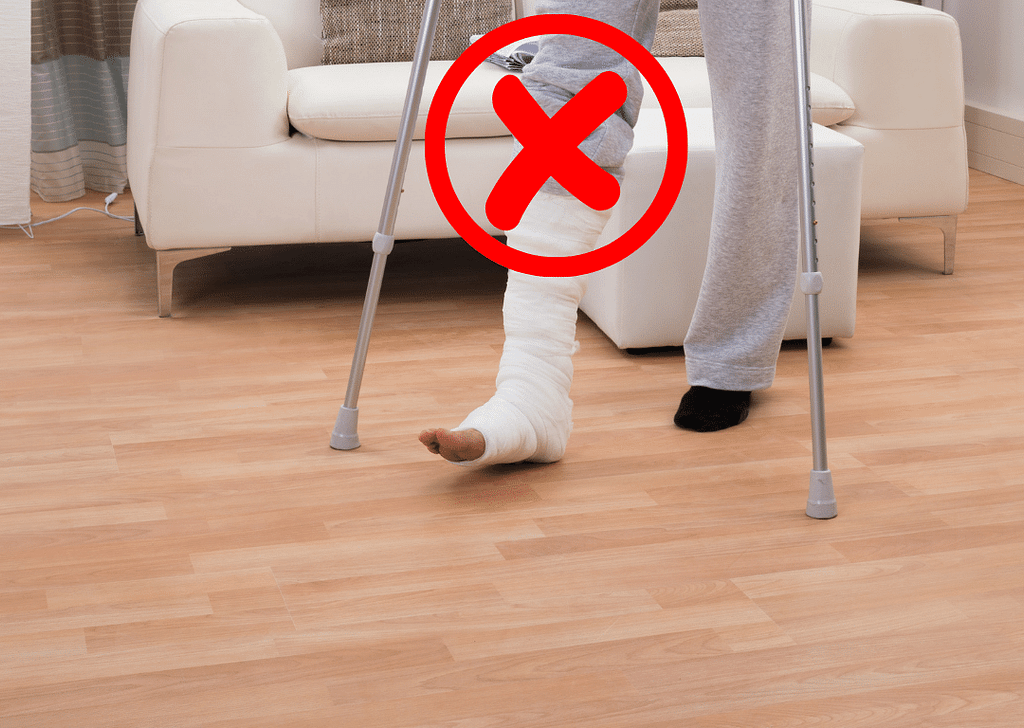 Person on crutches. Picture is indicating that he is not allowed to put any weight on his injured leg.